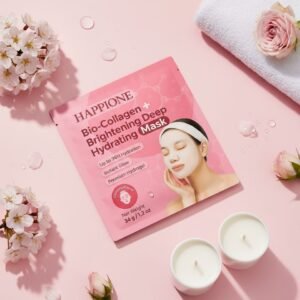 HAPPIONE Bio-Collagen Brightening Hydrating Deep Mask package on pink background with roses, candles, towel, and water droplets