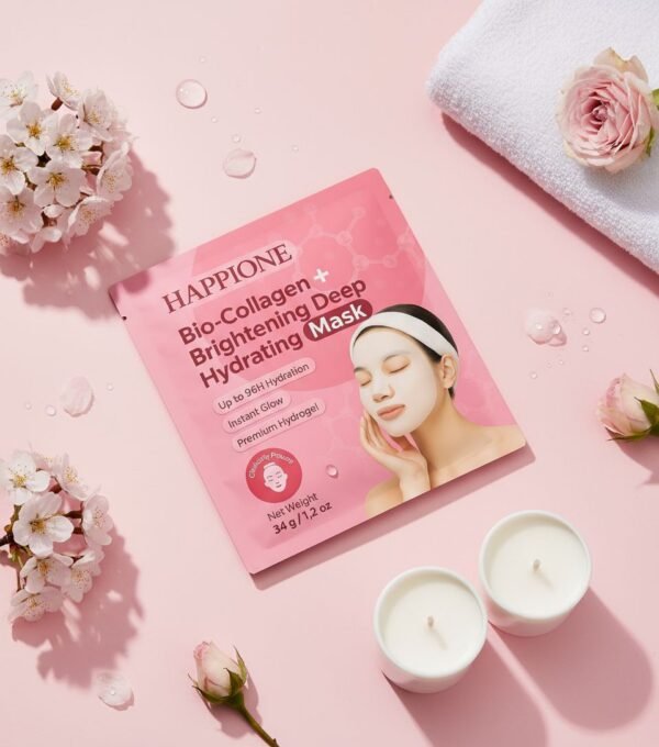 HAPPIONE Bio-Collagen Brightening Hydrating Deep Mask package on pink background with roses, candles, towel, and water droplets